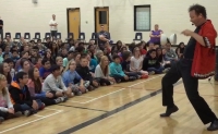 Paul Isaak wows students by combining skillful juggling with comedy